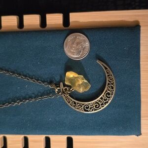 Brass moon and citrine crystal pendant